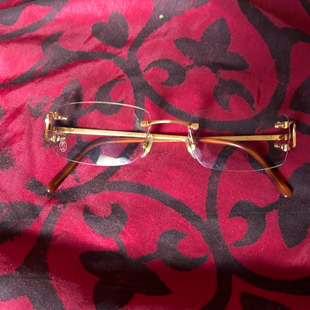 18 karat gold Cartier glasses transitions, not prescription